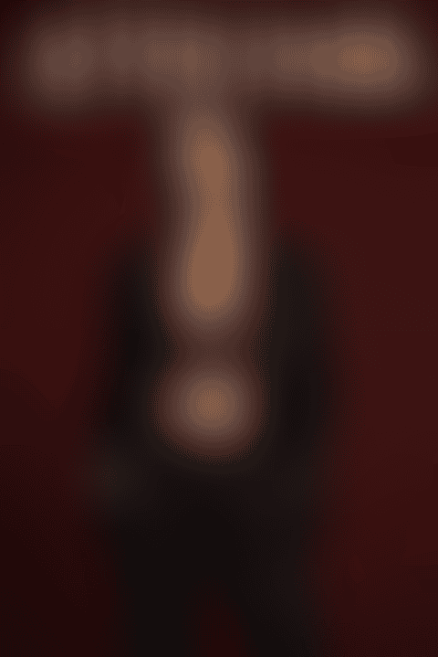 Magazine cover of a woman in an open black satin tuxedo blazer on an oxblood backdrop, titled AFTER DARK with THE SILK ISSUE · NO. 07 below