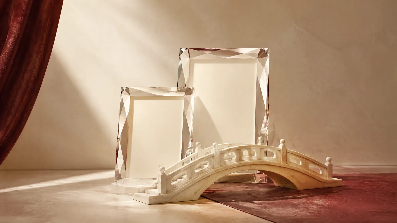 Two empty glass frames and an ivory bridge